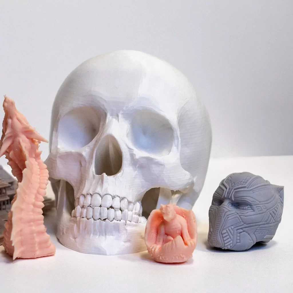 3D printed PLA objects including skull, figurines, and detailed models, by 360CSG for Film & Television